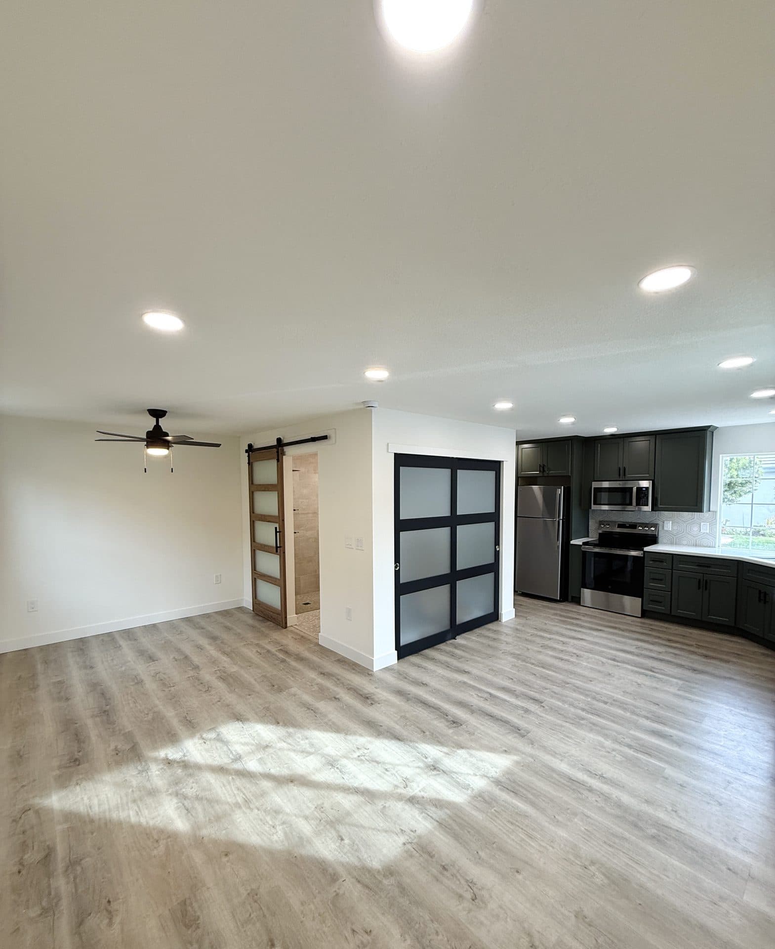 Garage-conversion ADU framed out on a Carmichael-area ranch property.