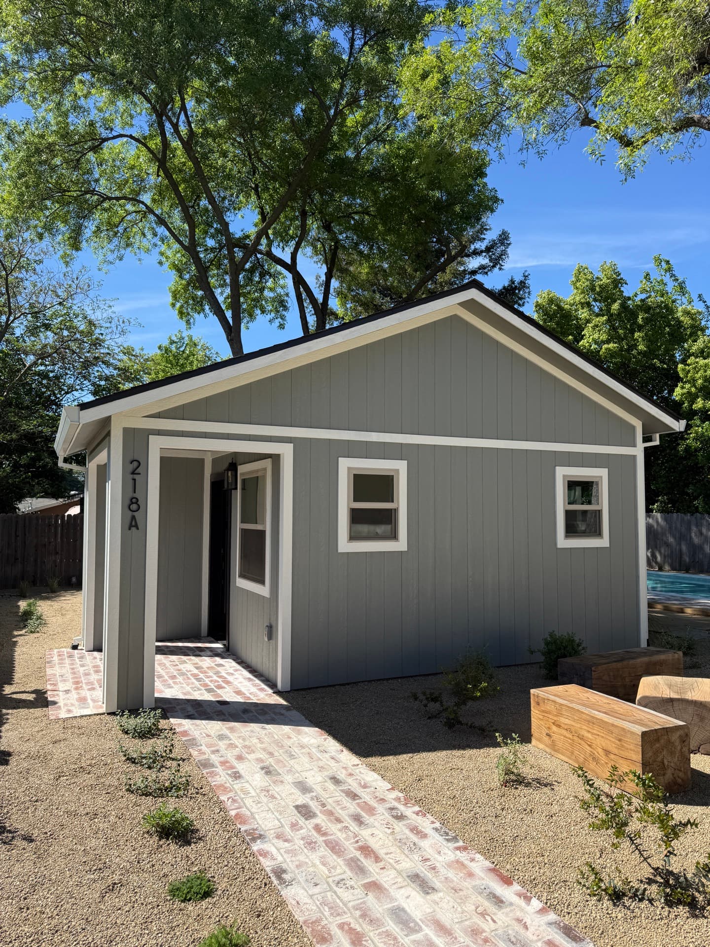 Finished interior of a Berkeley-area ADU with a compact modern kitchen and living space.