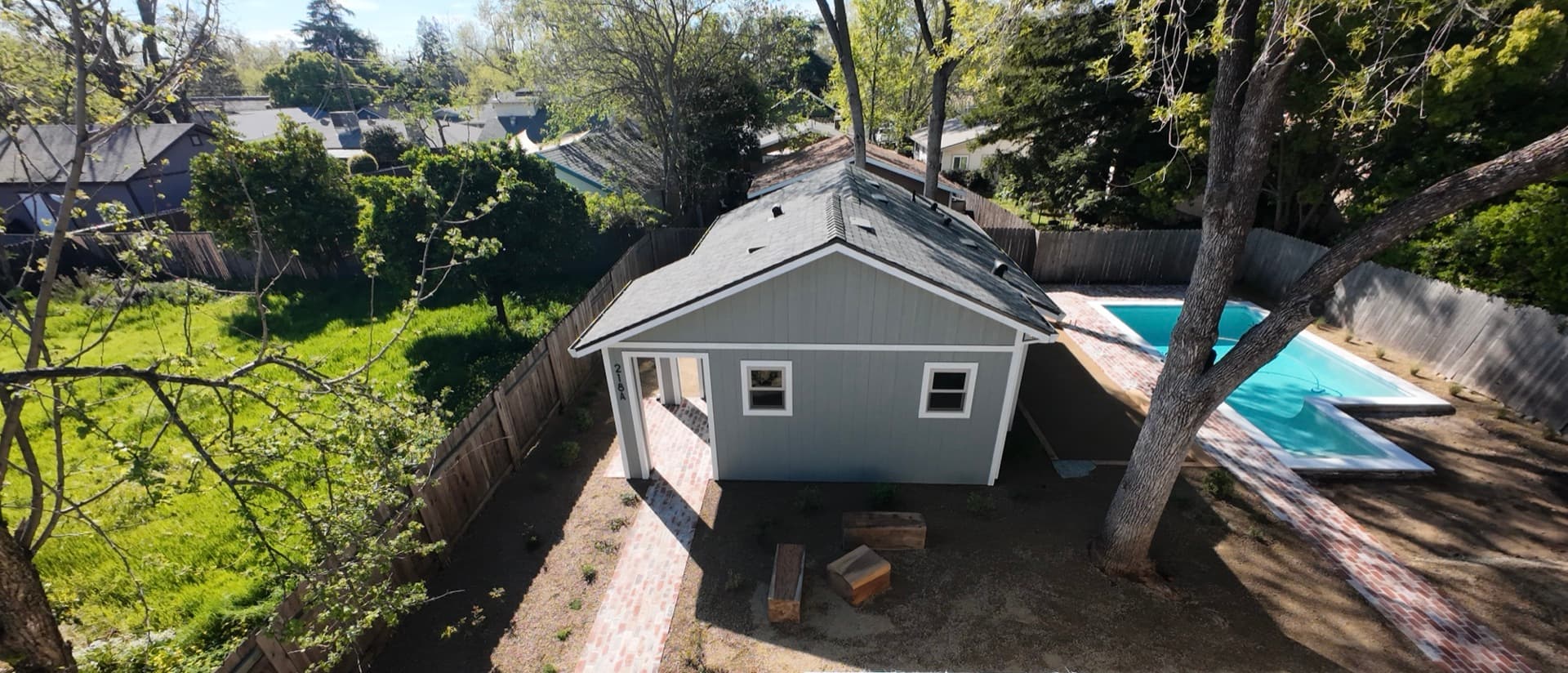 Compact detached ADU fit onto a small Berkeley backyard lot, Alameda County.